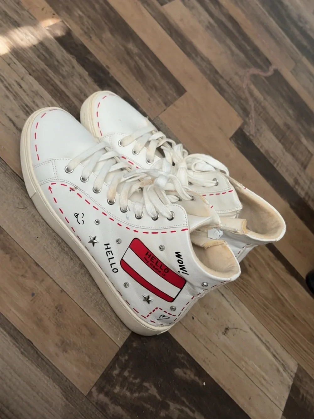 Aldo White High-Top Sneakers with Red Stitch Detailing